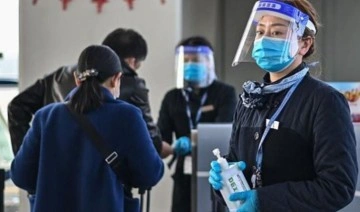 Dünya Sağlık Örgütü: Yolculara uçaklarda maske takmaları önerilmeli