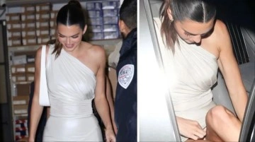 Süper mini elbisesiyle arabaya binmeye çalışan Kendall Jenner, frikik verdi