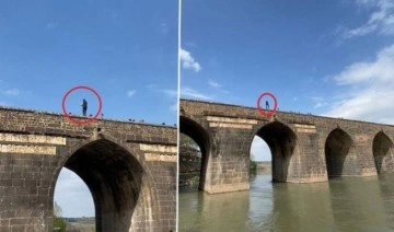 Tek başına tarihi köprüye çıktı: Metrelerce yükseklikte tehlikeli halay