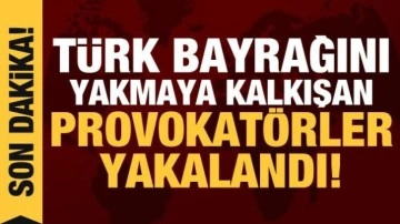 Türk bayrağını yakma girişiminde bulunan provokatör yakalandı!